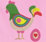 Motif de broderie machine d’une petite poule et son œuf